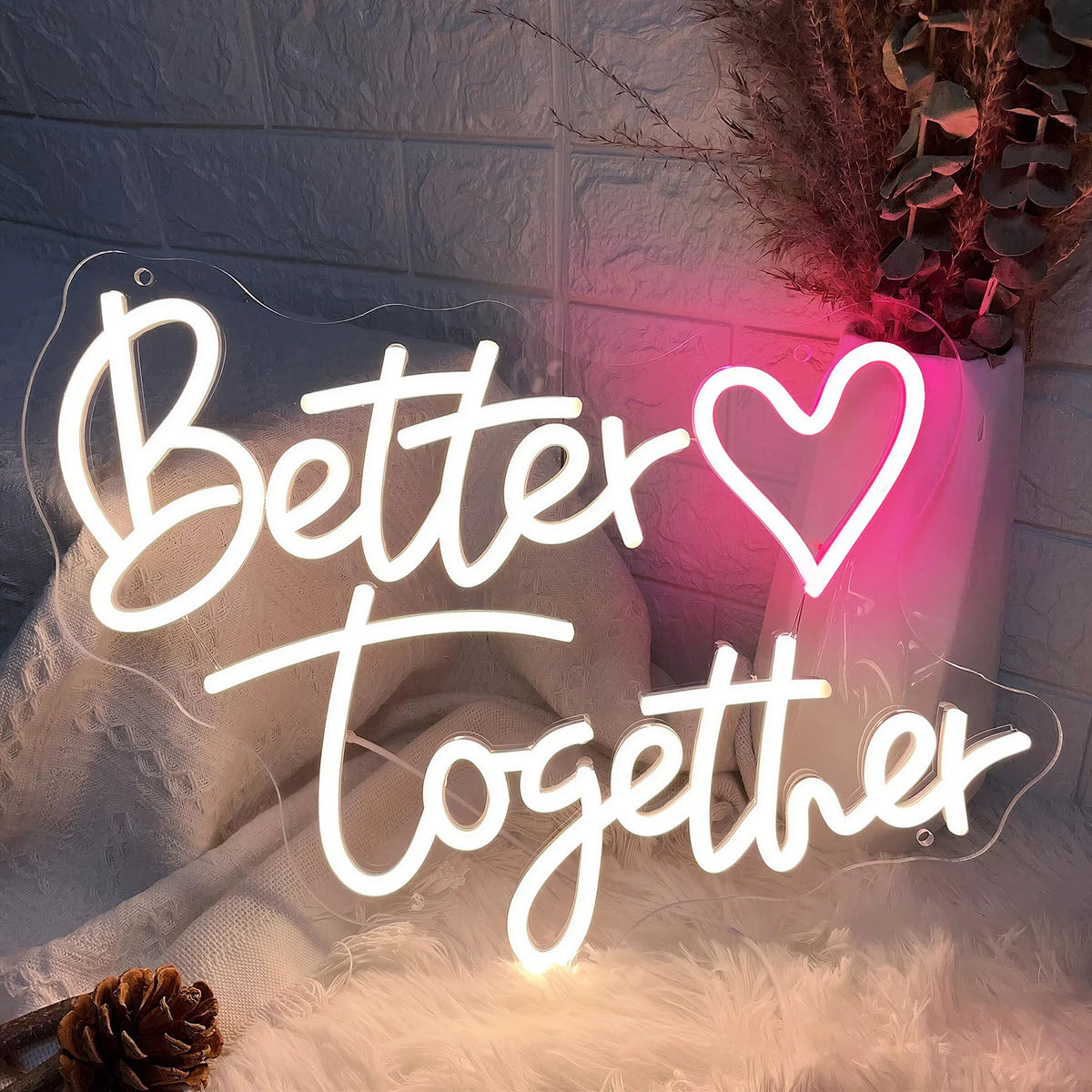 Better Together neon sign glowing at a celebration
